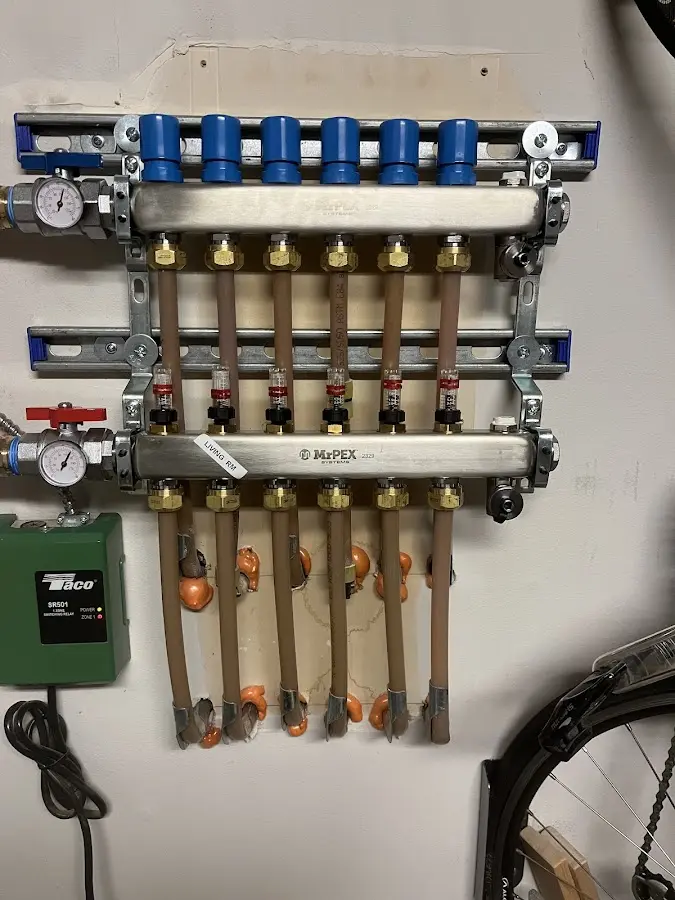 Plumber performing Gas Line Installation at a residential property in Pound Ridge